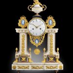 late Louis XVI ormolu and porcelain mounted white marble mantel clock with cameo of Chronos