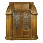 Louis Majorelle 'AUX ALGUES': A CABINET walnut, cameo and stained glass, wrought-iron mounts, carved with seaweed