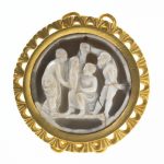 Gold-mounted sardonyx cameo pendant engraved with the birth of Bacchus