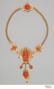 Coral and embossed gold parure Made in France, c.1840.