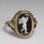 Ring with Cupid Chasing a Butterfly