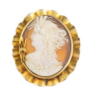 A mid Victorian 15ct gold cameo brooch. Carved to depict Demeter in profile