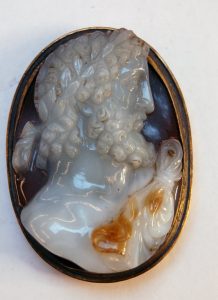 Sardonyx cameo engraved with a laureate bearded bust of Zeus in profile