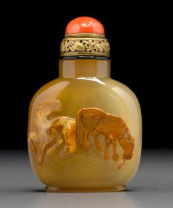 A cameo chalcedony snuff bottle carved with two horses