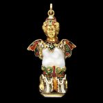Enamelled gold figure, the body formed around a baroque pearl. The base is set with a lapis lazuli which has not been cut with any design.