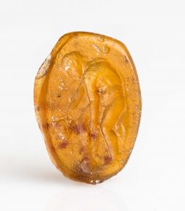 Oval gem with Perseus holding head of Medusa
