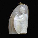 Fragment of a large chalcedony cameo depicting the winged figure of Nike grasping her shield