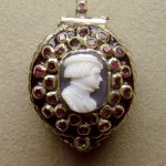 Watch with Cameo surrounded by rubies