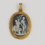 A carved hardstone cameo pendant Carved to depict the flaying of Marsyas