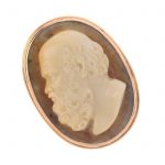 An agate cameo ring. The oval agate carved to depict Socrates in profile