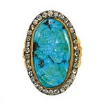 A diamond and turquoise cameo ring