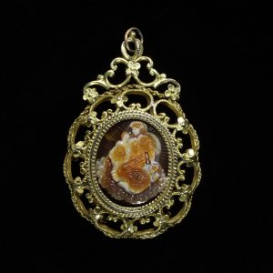 Reliquary pendant in the form of an onyx cameo of the Virgin and Child, set in silver-gilt openwork.